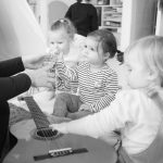 Babies enjoying a music class at Hove Village Day Nursery