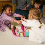 children playing with their hands