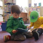 children reading a book