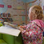 child reading a book