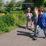 children walking through the park