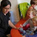 children involved in a ball pit