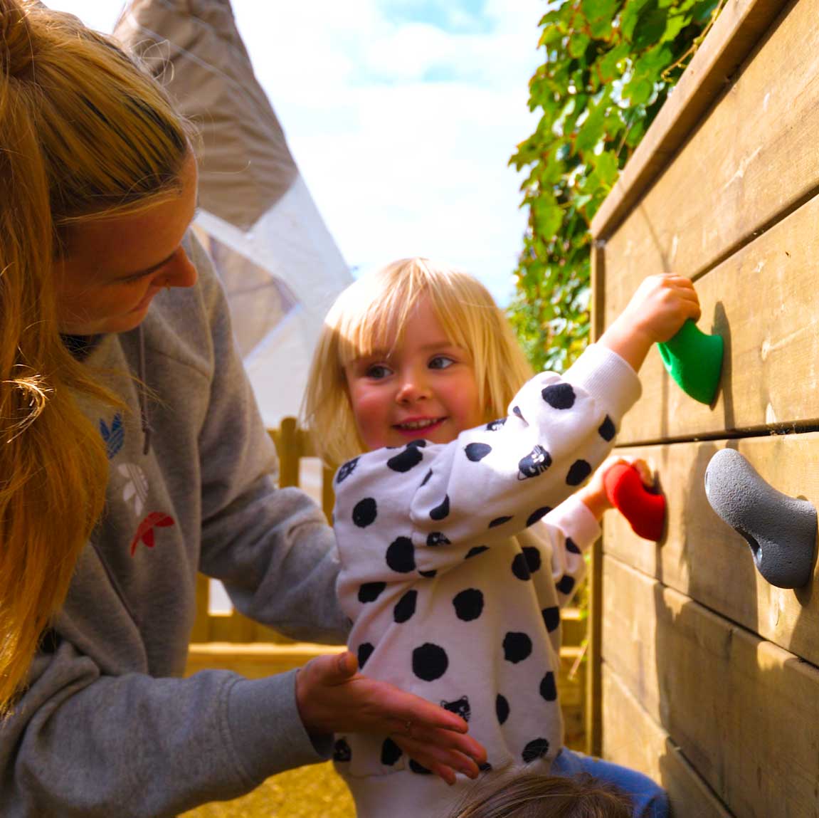 girl on climbing wall